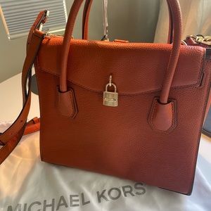 Michael Kors medium satchel with a cross body purse. Comes with dust bag.